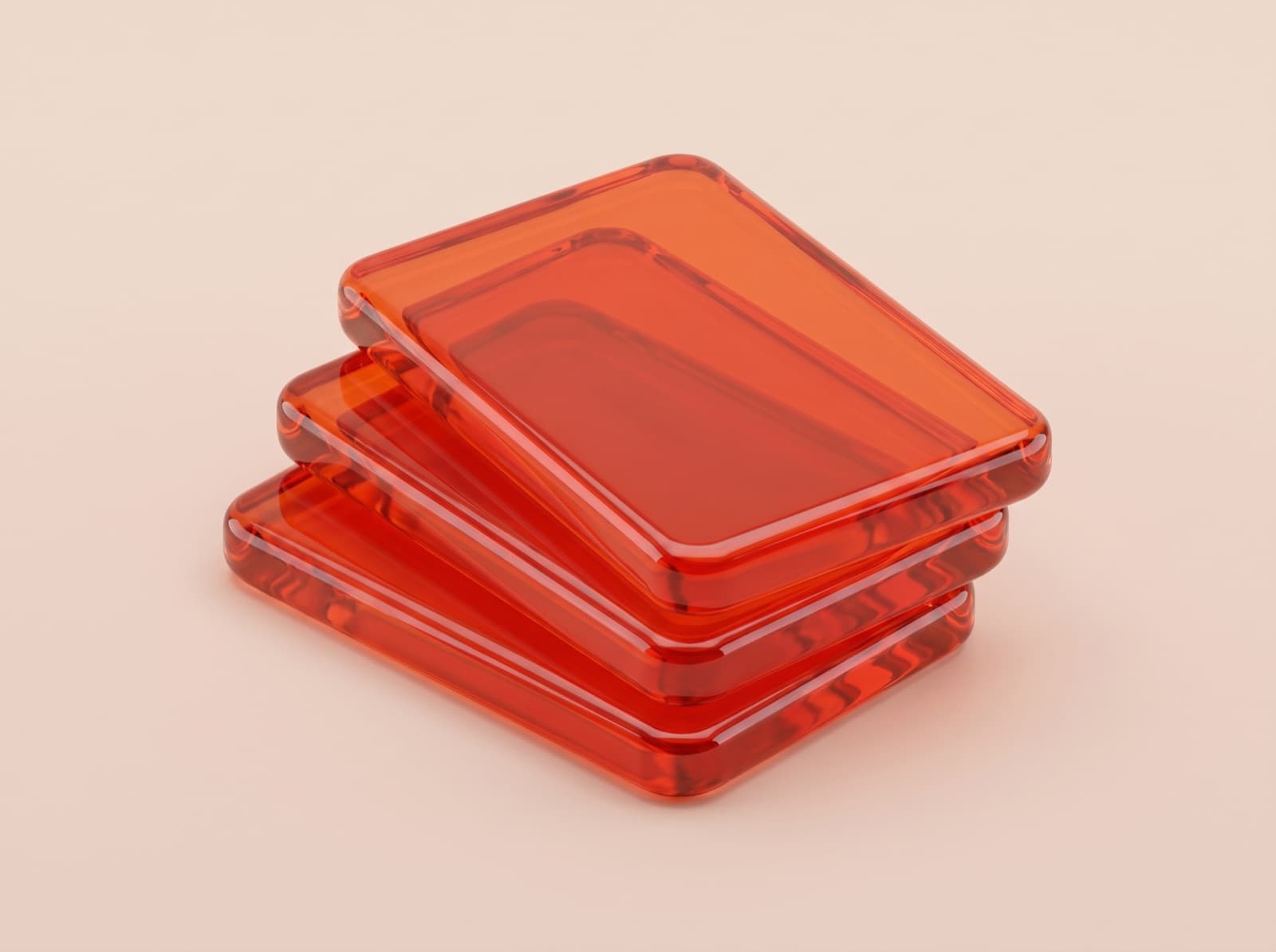 Three fanned page slabs sculpted in glossy orange glass on a blush background